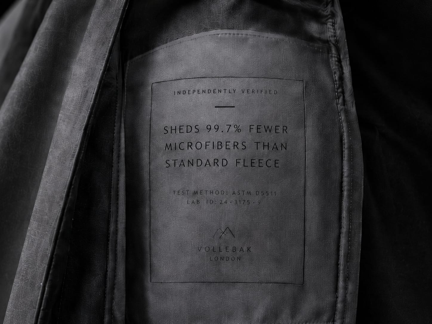 Interior spec plate: independently verified, sheds 99.7 percent fewer microfibers than standard fleece